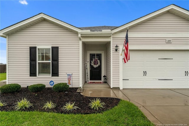115 Doubletree Ln, Autryville, NC 28318 - view of front of home featuring driveway, a garage, and a shingled roof