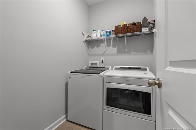 115 Doubletree Ln, Autryville, NC 28318 - washroom featuring washer and clothes dryer and baseboards