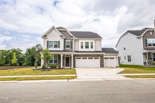 1051 Jura Ridge Dr, Fuquay Varina, NC 27526 - craftsman-style home featuring driveway, stone siding, board and batten siding, and an attached garage