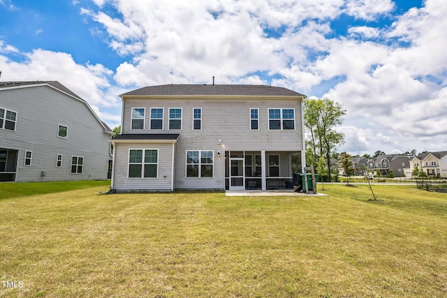 1051 Jura Ridge Dr, Fuquay Varina, NC 27526 - rear view of property featuring a sunroom and a lawn