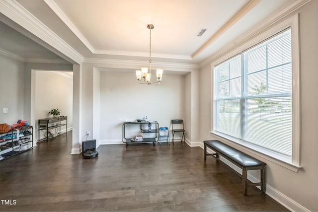 1051 Jura Ridge Dr, Fuquay Varina, NC 27526 - sitting room with dark wood finished floors, ornamental molding, and a chandelier
