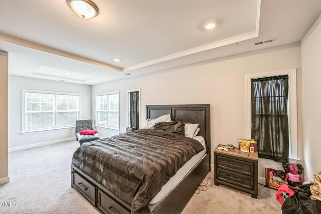 1051 Jura Ridge Dr, Fuquay Varina, NC 27526 - bedroom with light colored carpet, a tray ceiling, and recessed lighting
