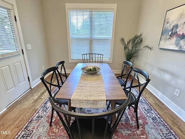 118 Chestnut St, Durham, NC 27707 - dining space featuring wood finished floors and plenty of natural light