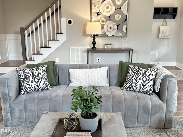 118 Chestnut St, Durham, NC 27707 - living area featuring wood finished floors and stairway