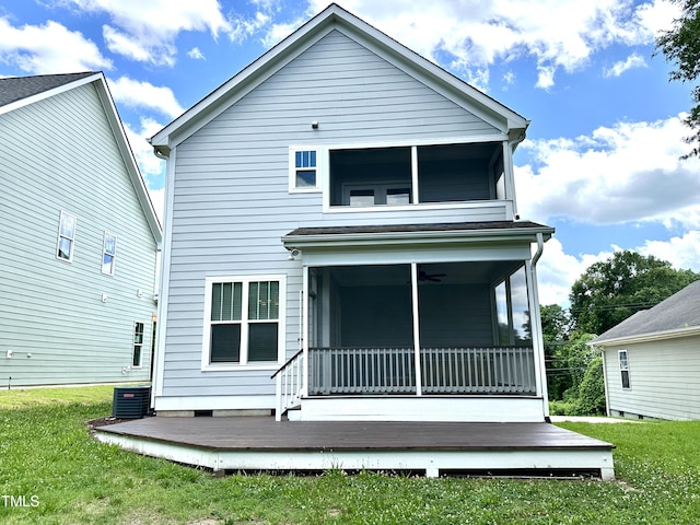 118 Chestnut St, Durham, NC 27707 - back of property with a yard and a ceiling fan