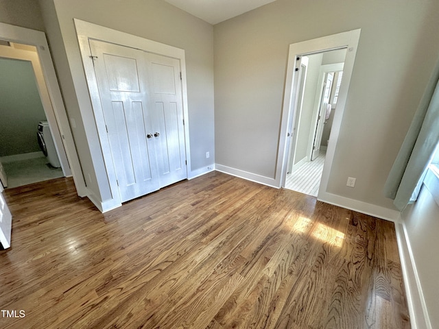 118 Chestnut St, Durham, NC 27707 - unfurnished bedroom with wood finished floors and a closet