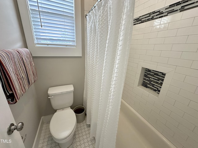 118 Chestnut St, Durham, NC 27707 - bathroom featuring toilet and shower / tub combo