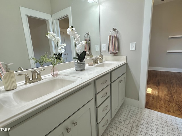 118 Chestnut St, Durham, NC 27707 - full bath with double vanity and baseboards