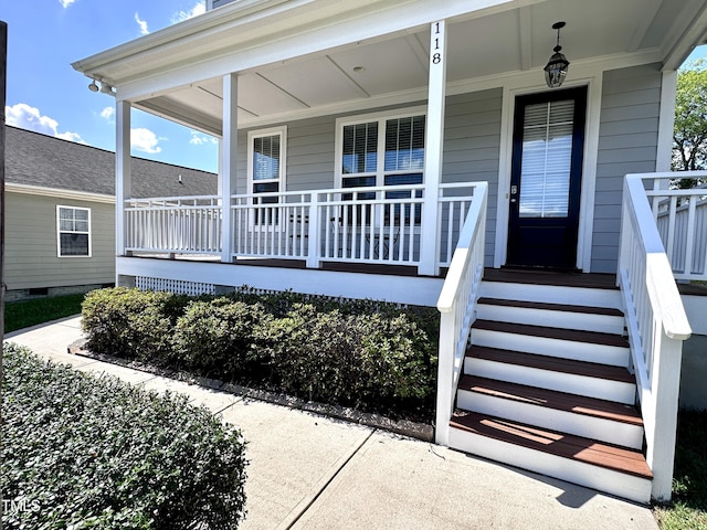 118 Chestnut St, Durham, NC 27707 - doorway to property featuring a porch