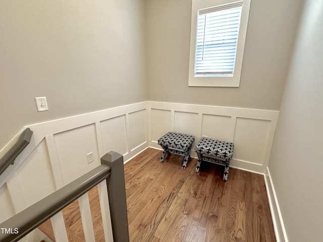 118 Chestnut St, Durham, NC 27707 - washroom featuring a wainscoted wall, wood finished floors, and a decorative wall