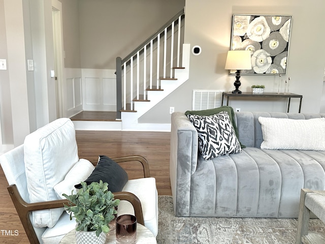 118 Chestnut St, Durham, NC 27707 - living area featuring wood finished floors and stairway