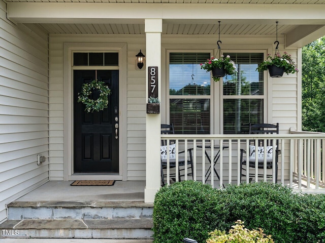857 Stable Fern Dr, Fuquay Varina, NC 27526 - view of exterior entry with covered porch