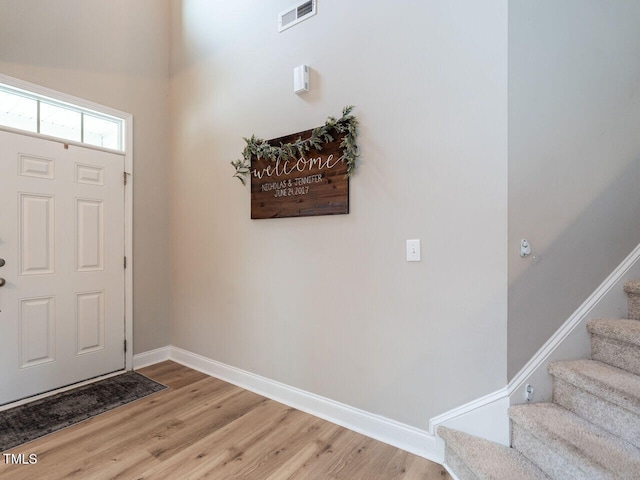 857 Stable Fern Dr, Fuquay Varina, NC 27526 - foyer with stairs and light wood-type flooring