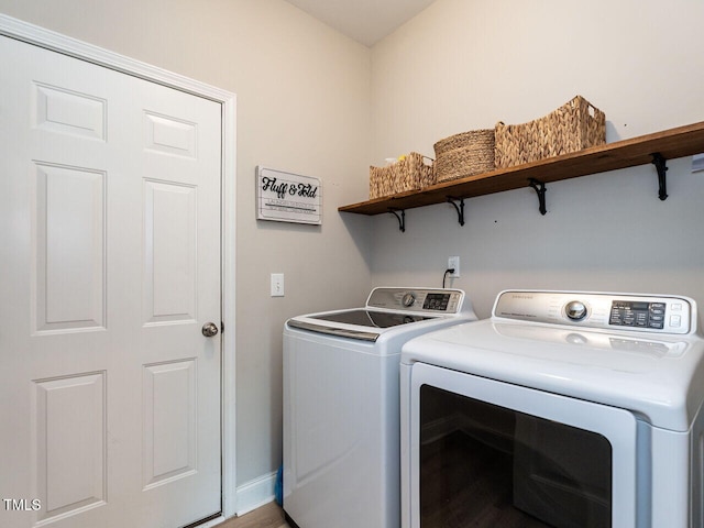 857 Stable Fern Dr, Fuquay Varina, NC 27526 - laundry area featuring separate washer and dryer and wood finished floors