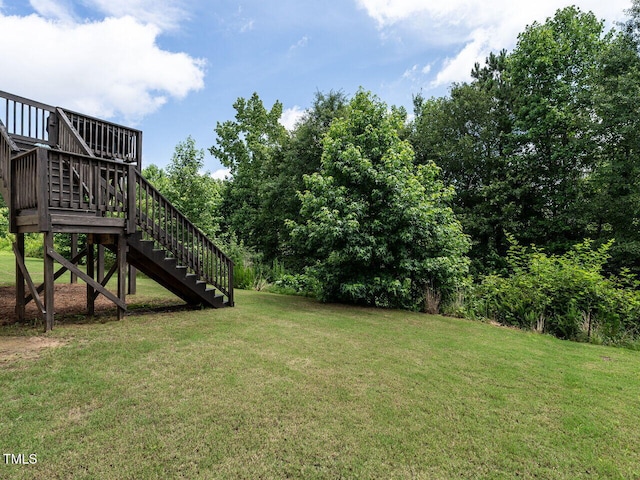 857 Stable Fern Dr, Fuquay Varina, NC 27526 - view of grassy yard featuring stairway and a wooden deck