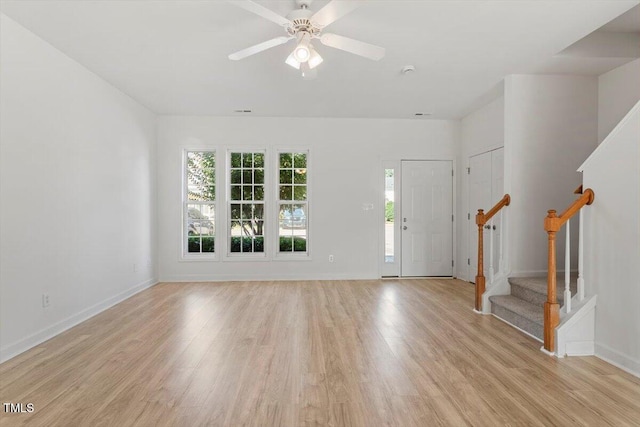 8326 Glenwood Springs Ct, Raleigh, NC 27616 - foyer entrance featuring stairway, light wood-style flooring, and ceiling fan