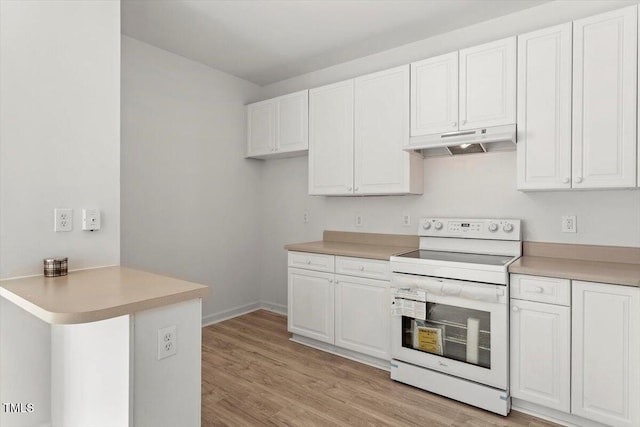 8326 Glenwood Springs Ct, Raleigh, NC 27616 - kitchen featuring electric range, under cabinet range hood, white cabinets, and a peninsula
