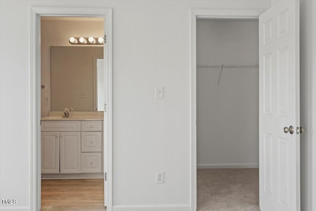 8326 Glenwood Springs Ct, Raleigh, NC 27616 - bathroom featuring vanity and baseboards