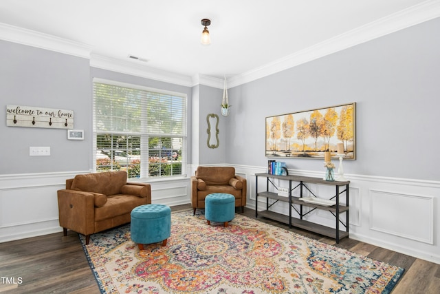 304 Forbes Rd, Wake Forest, NC 27587 - sitting room with crown molding, wood finished floors, and a wainscoted wall