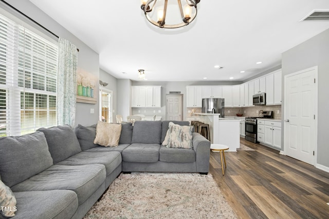 304 Forbes Rd, Wake Forest, NC 27587 - living area featuring a chandelier, dark wood finished floors, and recessed lighting