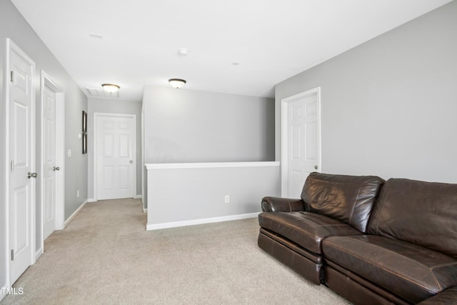 304 Forbes Rd, Wake Forest, NC 27587 - living room featuring light colored carpet and baseboards