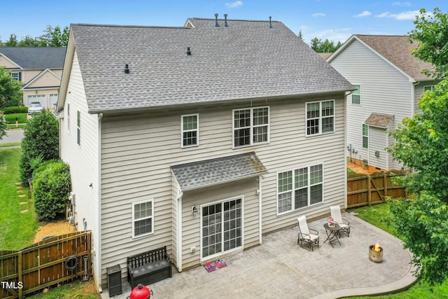 304 Forbes Rd, Wake Forest, NC 27587 - rear view of property with a patio area and a shingled roof