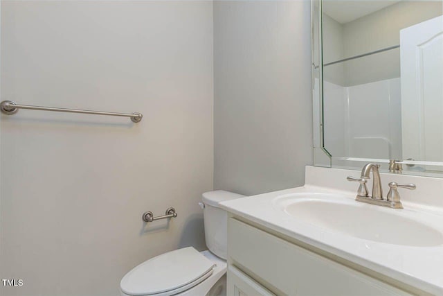 996 Tender Dr, Apex, NC 27502 - bathroom featuring vanity and toilet