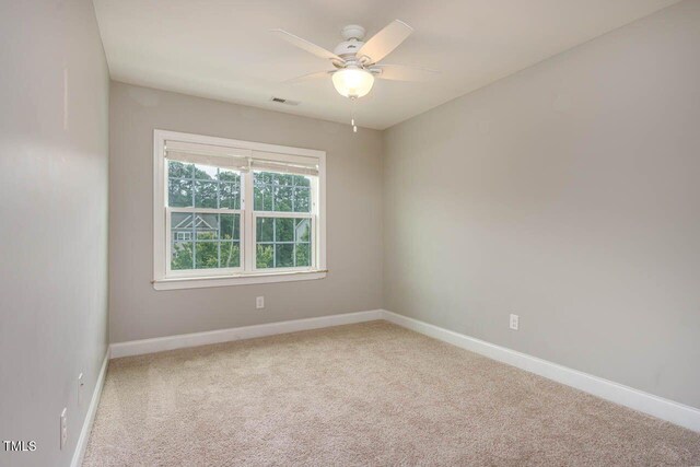 996 Tender Dr, Apex, NC 27502 - unfurnished room featuring a ceiling fan and carpet floors