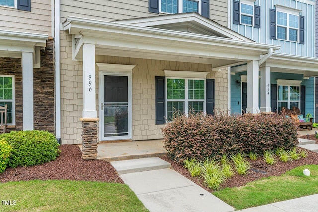996 Tender Dr, Apex, NC 27502 - entrance to property with a porch and stone siding