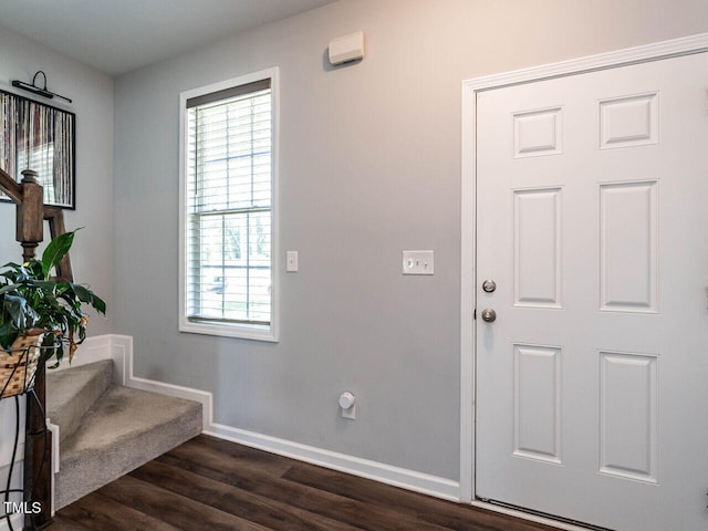157 E Wilson St, Clayton, NC 27520 - foyer entrance featuring stairs, healthy amount of natural light, and dark wood-style flooring