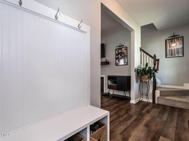 157 E Wilson St, Clayton, NC 27520 - mudroom featuring dark wood-style flooring and baseboards