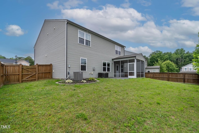 8005 Caithness St, Raleigh, NC 27616 - back of property with a sunroom and a fenced backyard