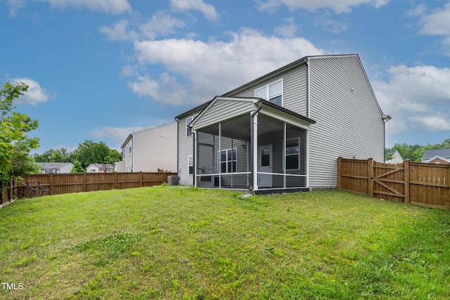 8005 Caithness St, Raleigh, NC 27616 - back of property featuring a sunroom and a fenced backyard