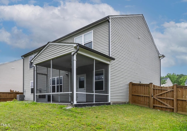 8005 Caithness St, Raleigh, NC 27616 - back of house with a sunroom