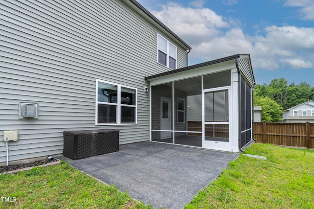 8005 Caithness St, Raleigh, NC 27616 - back of house with a sunroom and a patio area