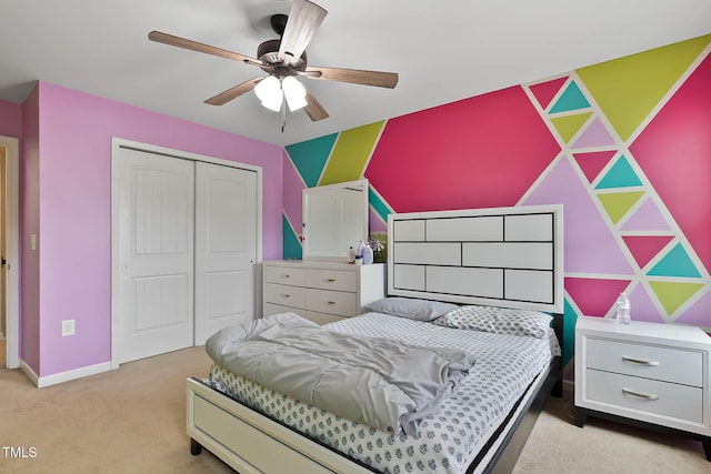 8005 Caithness St, Raleigh, NC 27616 - bedroom featuring a closet, light carpet, and ceiling fan