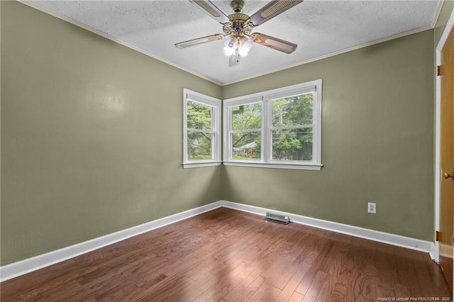 1905 Mcgougan Rd, Fayetteville, NC 28303 - empty room with hardwood / wood-style floors, ceiling fan, and crown molding