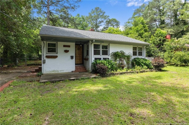 1905 Mcgougan Rd, Fayetteville, NC 28303 - view of front of home featuring a chimney and brick siding