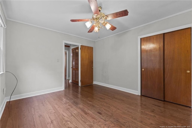 1905 Mcgougan Rd, Fayetteville, NC 28303 - unfurnished bedroom with wood finished floors, a closet, ornamental molding, and a ceiling fan