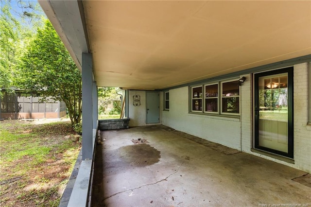 1905 Mcgougan Rd, Fayetteville, NC 28303 - view of patio featuring a carport