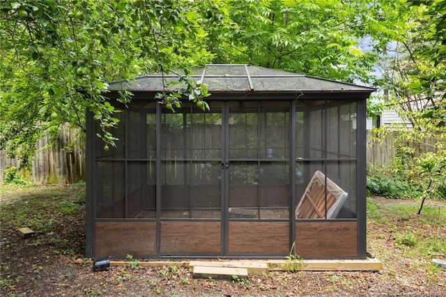1905 Mcgougan Rd, Fayetteville, NC 28303 - view of outbuilding featuring a sunroom