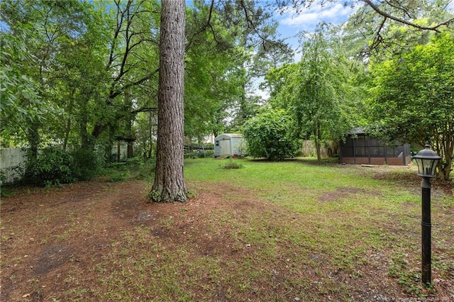 1905 Mcgougan Rd, Fayetteville, NC 28303 - view of yard with a shed