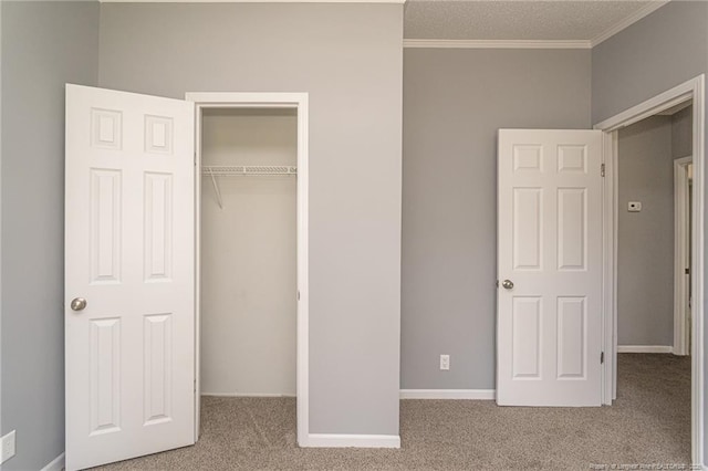 2990 Aberdeen Rd, Raeford, NC 28376 - unfurnished bedroom featuring carpet flooring, a closet, and ornamental molding