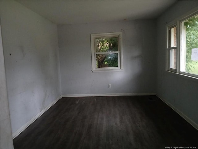4627 Cheltenham Rd, Fayetteville, NC 28304 - spare room featuring dark wood-type flooring and healthy amount of natural light