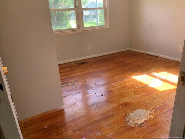 4627 Cheltenham Rd, Fayetteville, NC 28304 - unfurnished room with hardwood / wood-style floors and baseboards