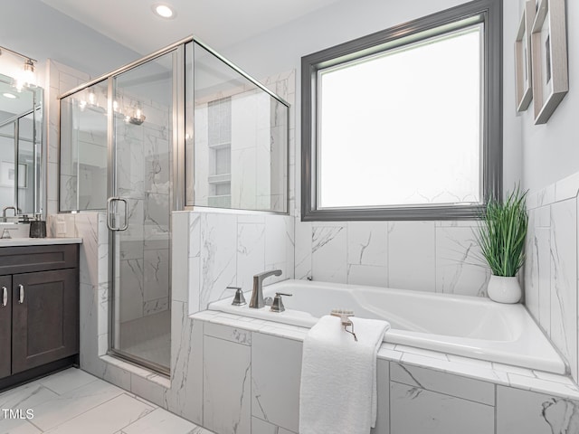 335 Glenn St, Franklinton, NC 27525 - bathroom featuring plenty of natural light, vanity, a garden tub, a marble finish shower, and recessed lighting