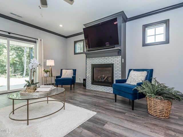 335 Glenn St, Franklinton, NC 27525 - living room featuring ornamental molding, healthy amount of natural light, a ceiling fan, wood finished floors, and recessed lighting