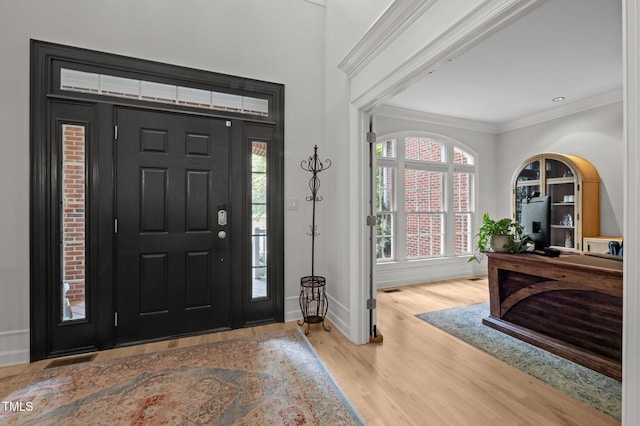 100 Redfoot Run Rd, Chapel Hill, NC 27516 - foyer with ornamental molding, wood finished floors, and healthy amount of natural light
