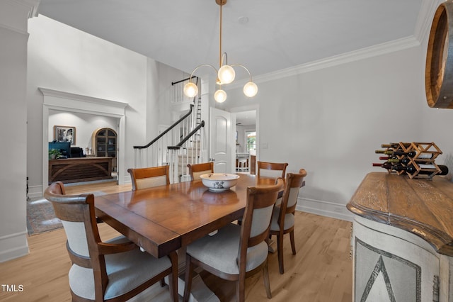 100 Redfoot Run Rd, Chapel Hill, NC 27516 - dining space with stairs, light wood finished floors, and crown molding