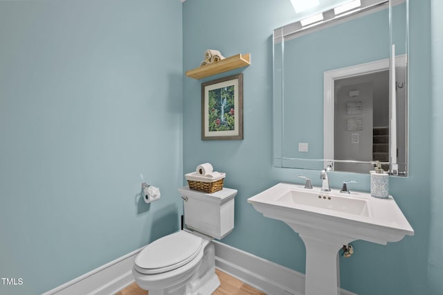 100 Redfoot Run Rd, Chapel Hill, NC 27516 - bathroom with toilet and wood finished floors